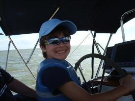 Captain Andrew at the Helm